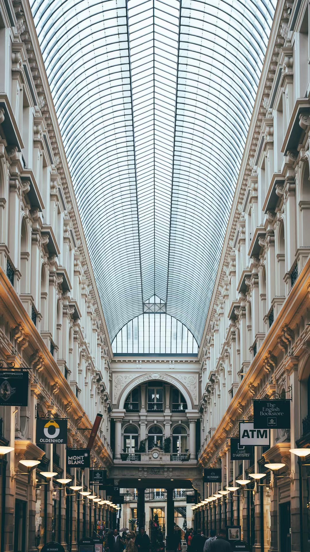 Glass barrel vault of The Passage arcade in The Hague.
